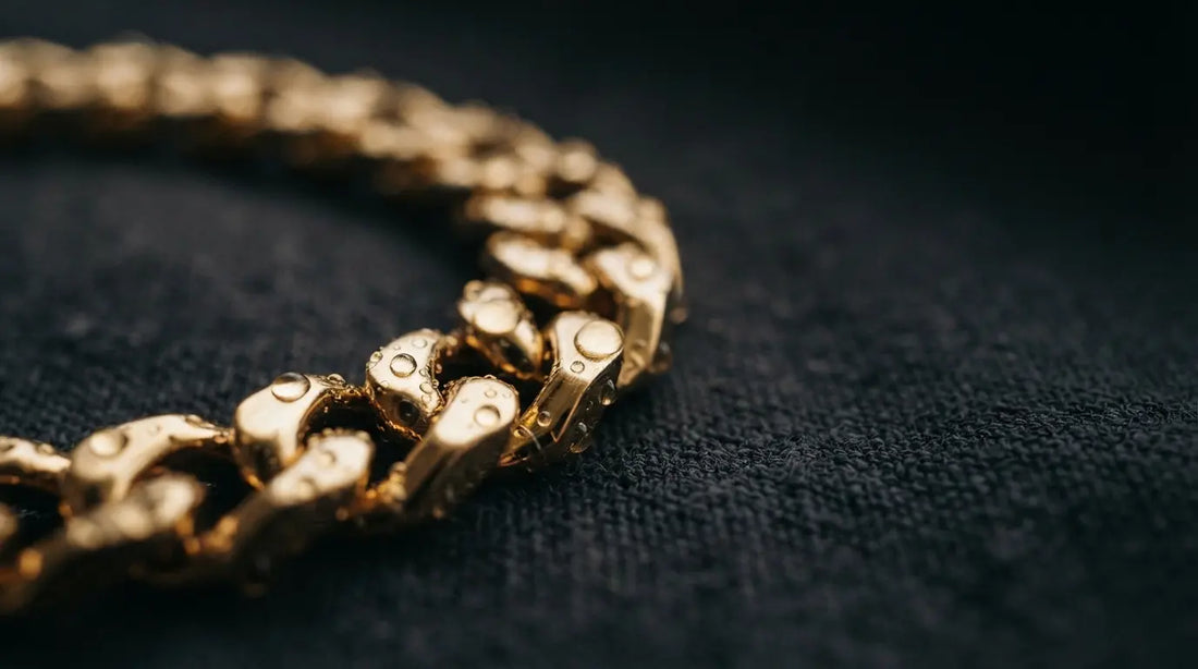 14K PVD gold plated stainless steel bracelet with water droplets — waterproof coating demonstration