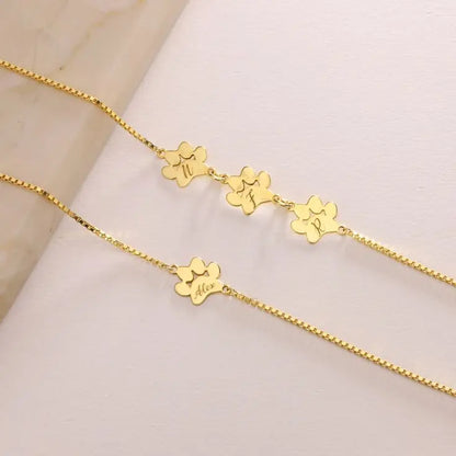 Гривна с лапичка и име - снимка на бижуто